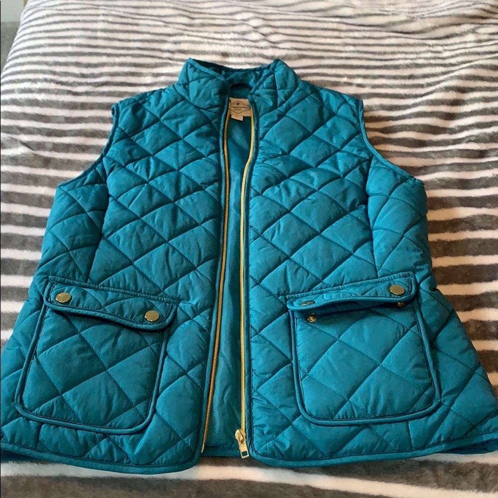 zip up blue vest